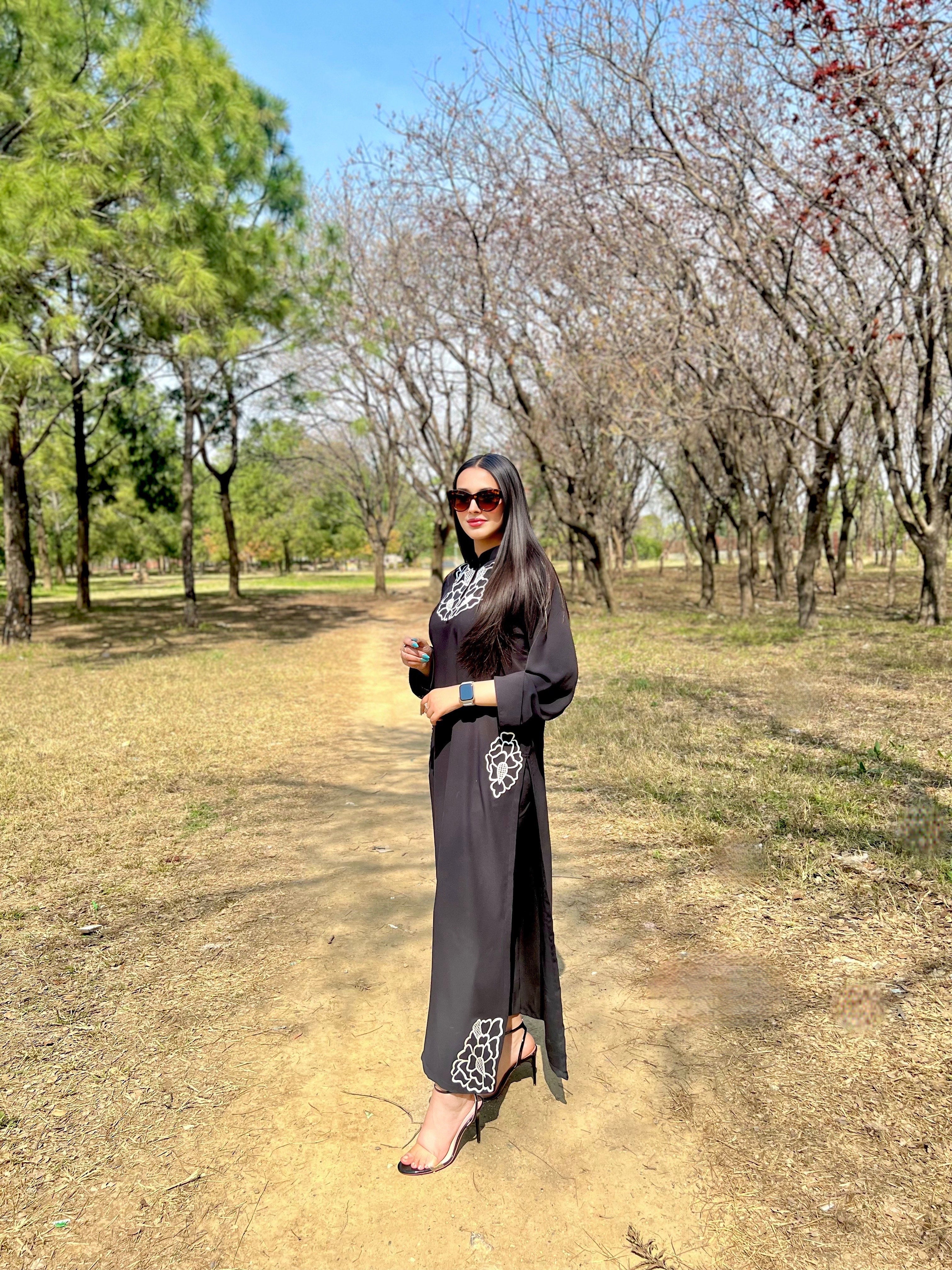 Black embroidered two pc Momina Ammar