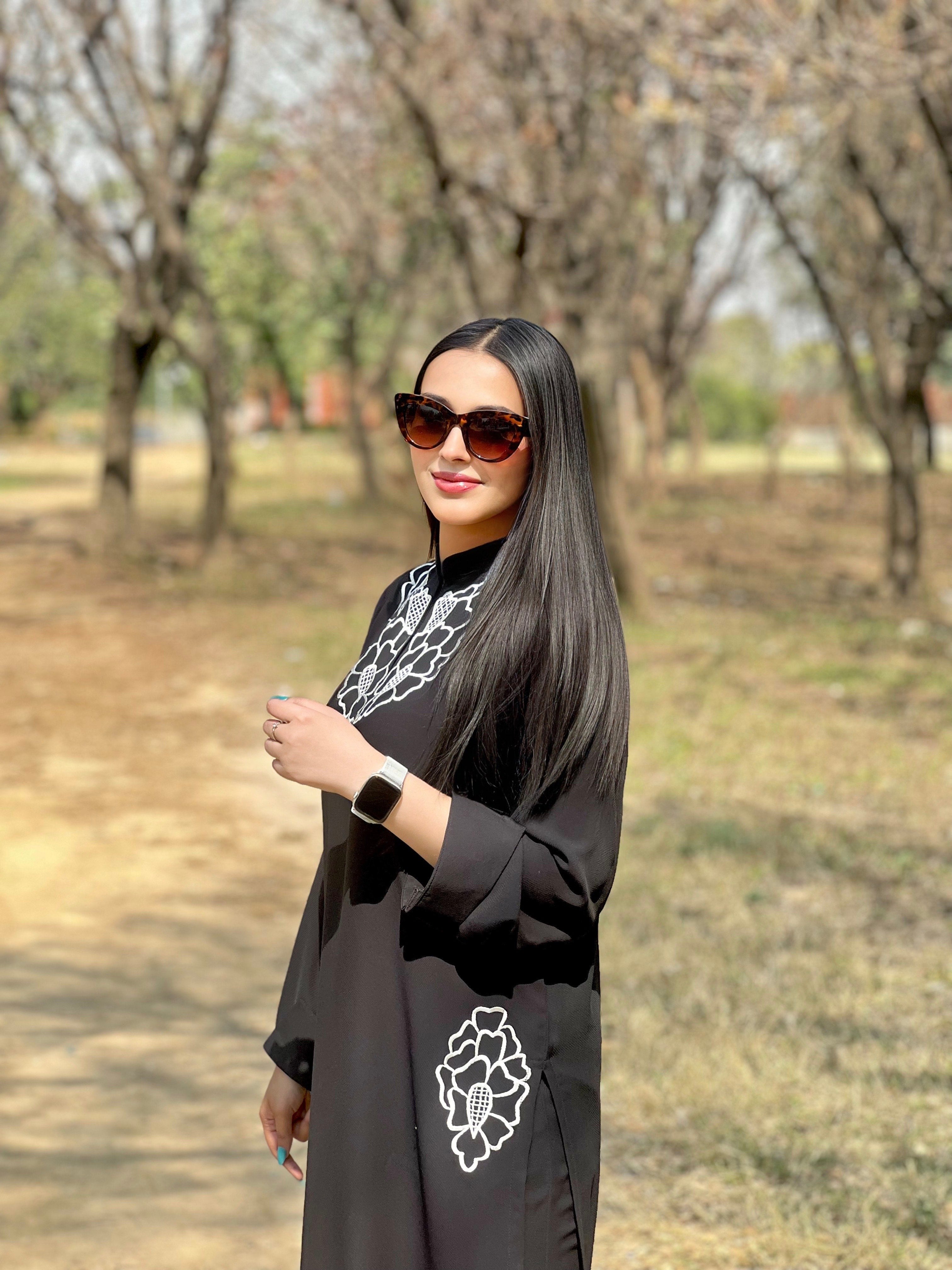 Black embroidered two pc Momina Ammar
