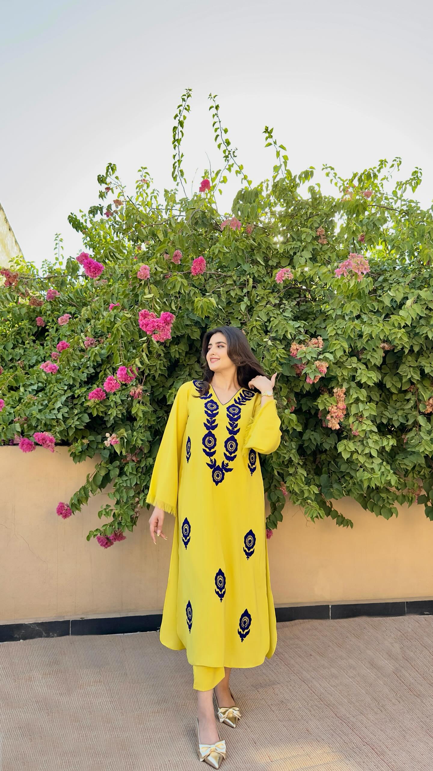 Yellow Ari Embroidered two pc Momina Ammar