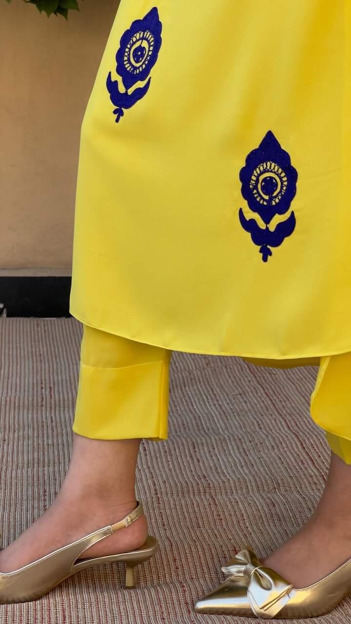 Yellow Ari Embroidered two pc Momina Ammar