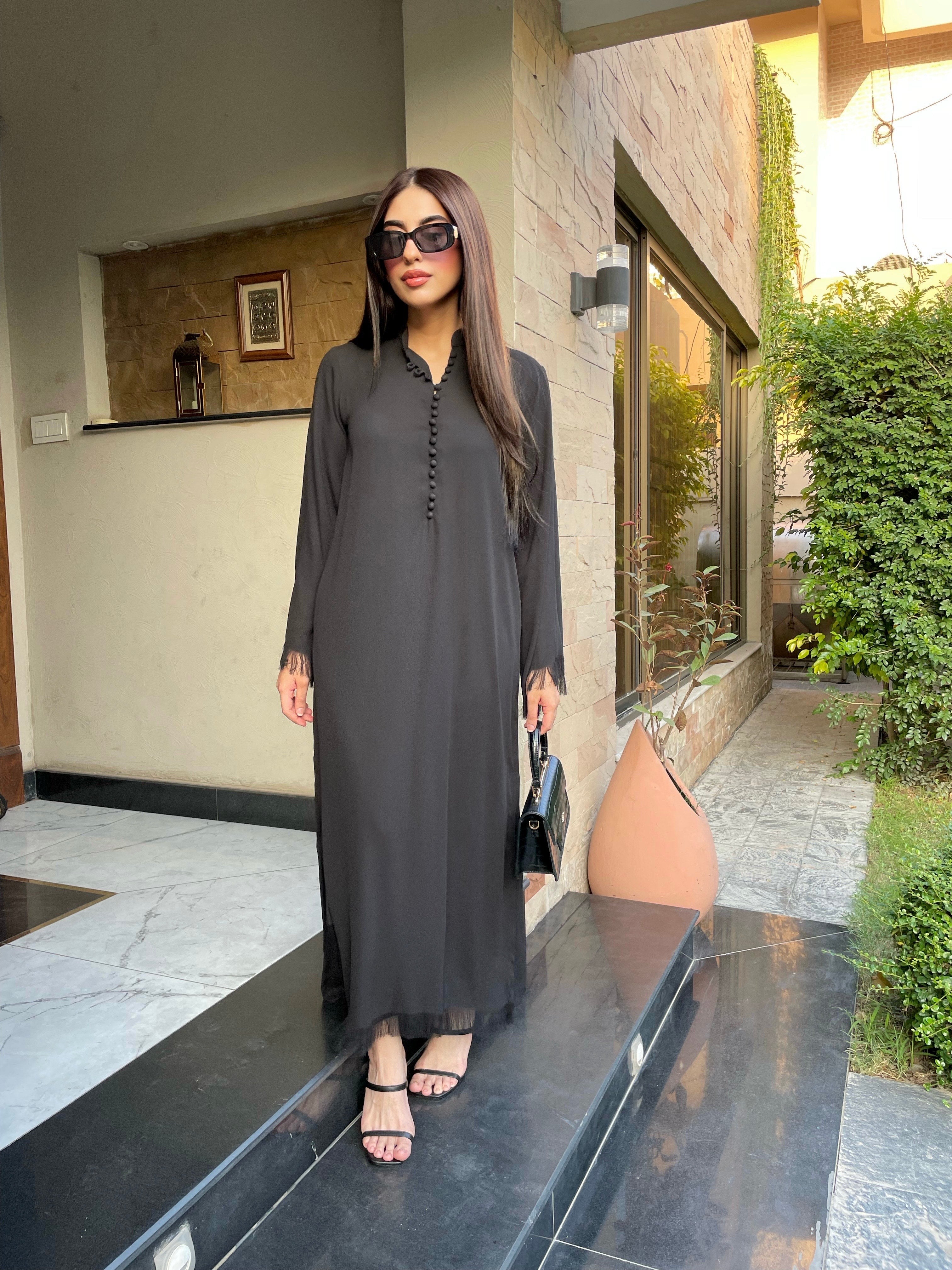 Basic 
Ready to wear
Pret wear 
Online shopping brands in Pakistan 
black co-ord set loop  buttons and fringes 
Dubai Delivery 
UAE delivery 
UK delivery 
Black colour fringes 
Georgette fabric 
Crepe fabric 
Momina Ammar
