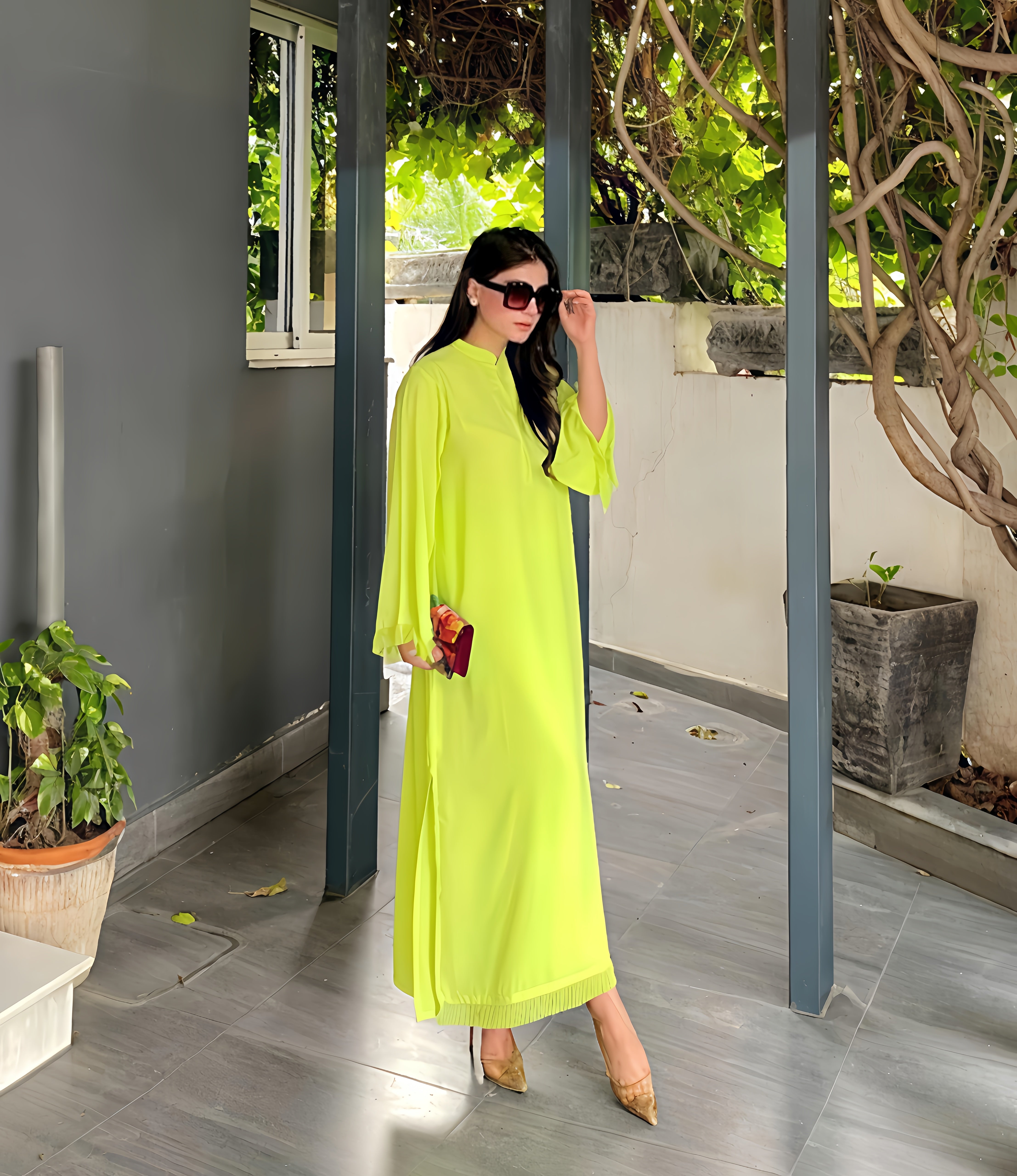 neon green colour outfit women wearing black and white outfits with embroidrey details, standing outdoors.
eid collection
pakistani top women clothing brand
pakistan most famous clothing brand
women clothes in pakistan
Pakistani brand delivering to uae uk usa canada 
Pakistani top women brand
georgette fabric outfits 
wrinkle free clothes 